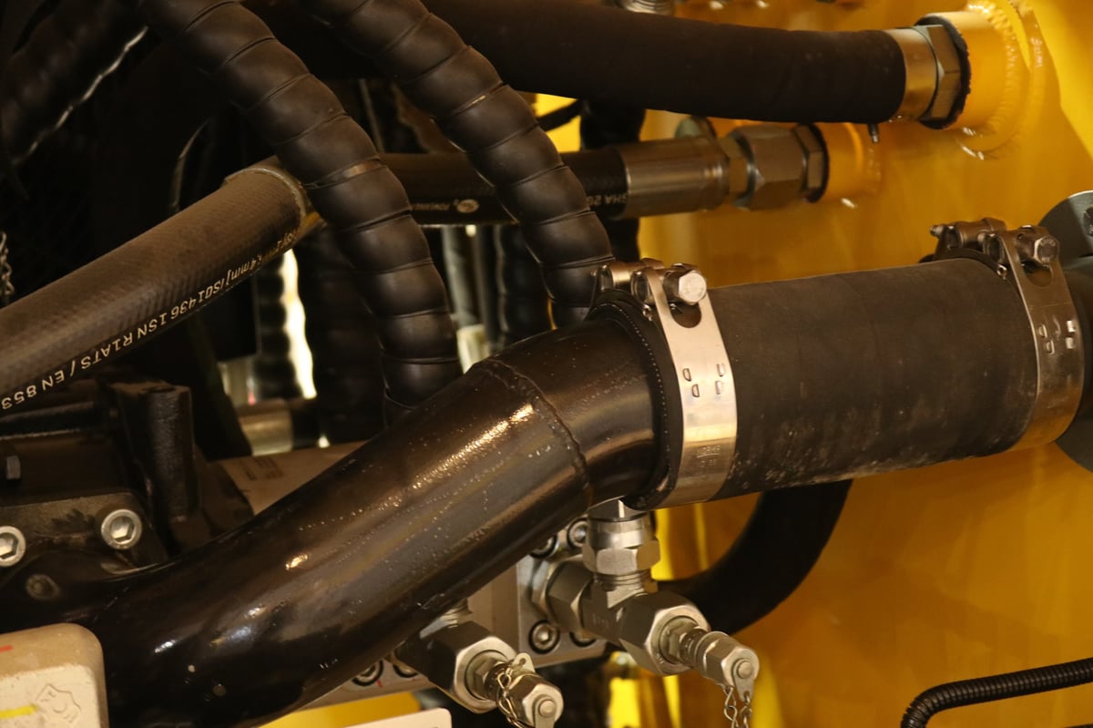 Industrial hydraulic system with blue hoses