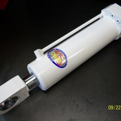 White water filter cartridge with blue emblem in plastic housing